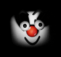 a clown face with a red nose and the letter y on its face