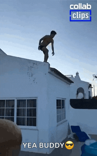 a man is jumping off the roof of a white building with the caption yea buddy