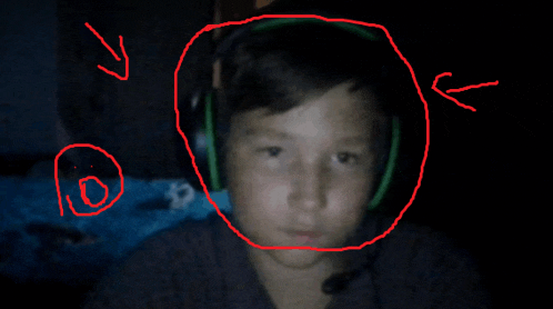 a drawing of a boy wearing headphones with a red circle around his head