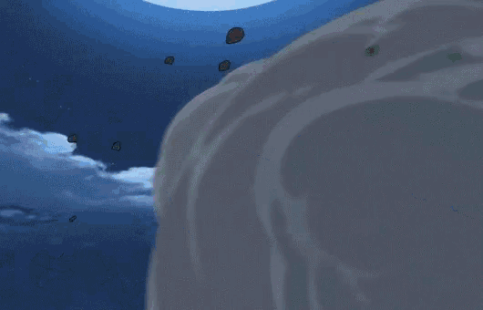 a man is falling through the air while holding a torch in his hand .