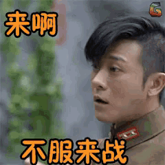 a man in a military uniform has chinese writing on his face .