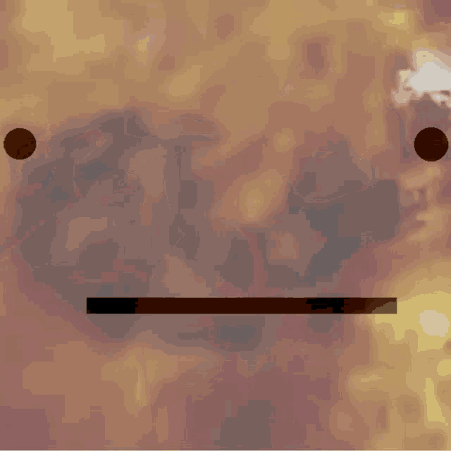a blurred image of a person 's face with a circle in the middle of it