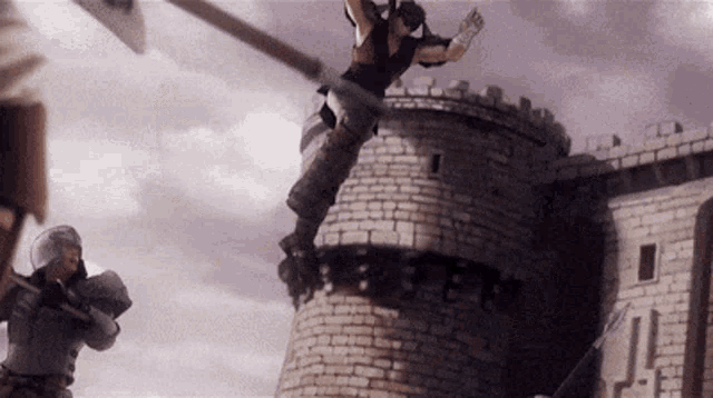 a man is flying through the air while holding a sword in front of a castle