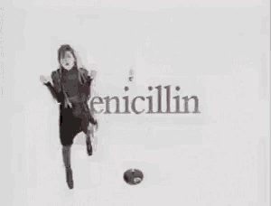 a black and white photo of a person jumping in the air with a soccer ball .