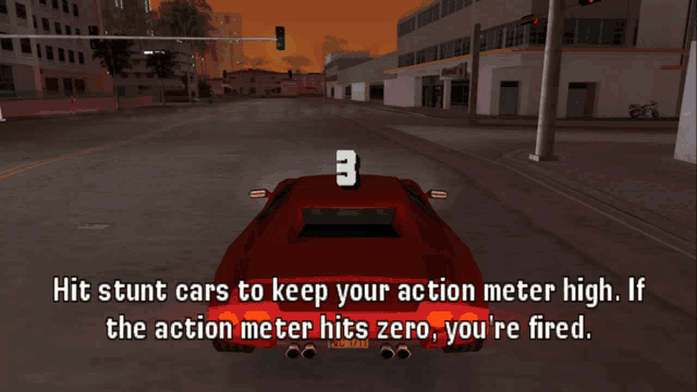 a red car with the number 2 on the back is driving down a street