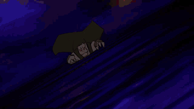 a close up of a cartoon character 's mouth with red eyes and a yellow dot