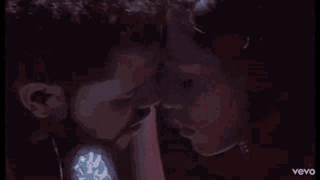 a close up of a red fireball with the word vevo in the corner