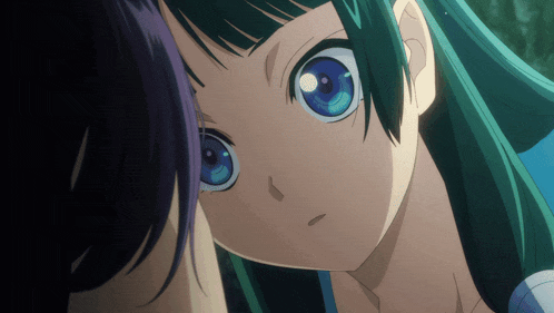 a close up of a girl 's face with green hair and blue eyes