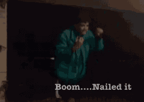 a man in a blue jacket is dancing with the words boom nailed it written below him