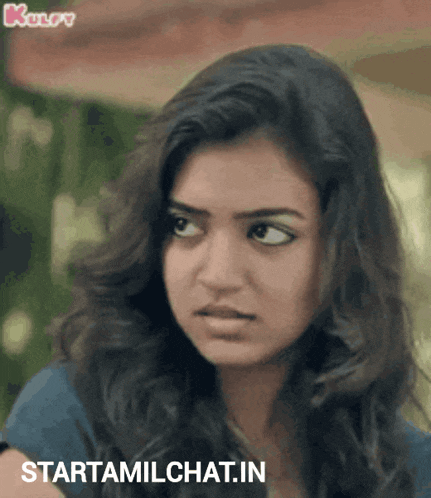 a close up of a woman 's face and the words starttamilchat.in