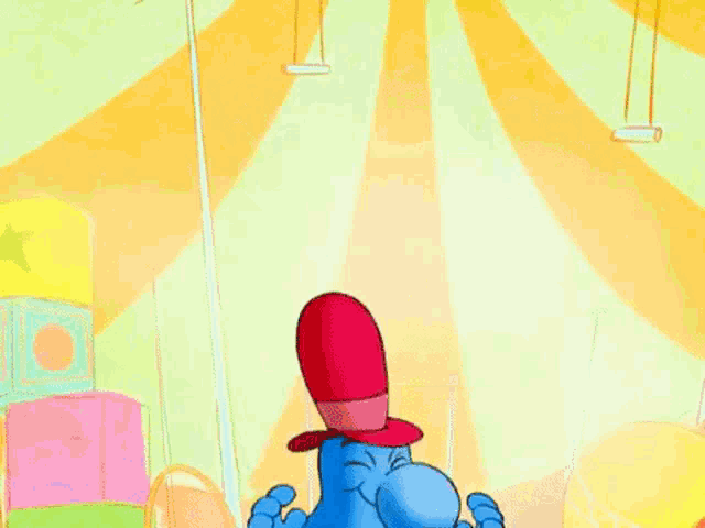 a blue cartoon character is wearing a red top hat and bow tie
