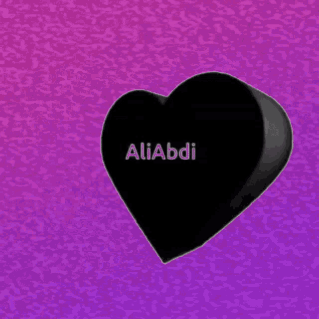 a black heart with the name aliabdi written in pink