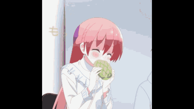 a girl with pink hair is holding a melon in her hand .