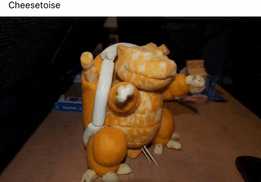 a stuffed animal made out of cheese sits on a table with the word cheesetoise above it