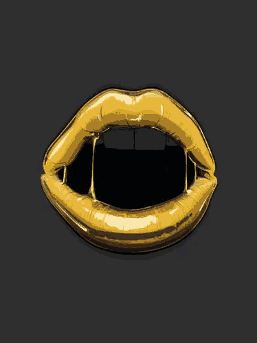 a close up of a woman 's mouth with gold lips