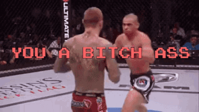 two men are fighting in a boxing ring with the words you a bitch ass written on the screen
