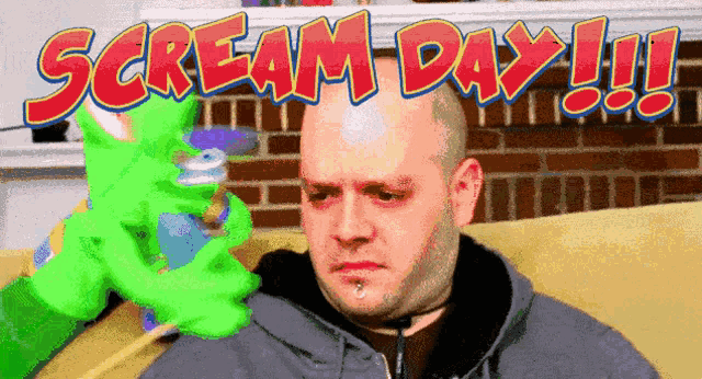 a man with a green hand holding a can that says scream day on it