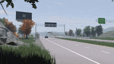 a highway with a green sign that says robertson springfield on it