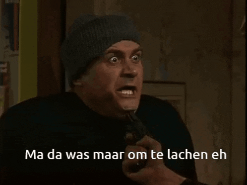a man with a mask on his head with the words ma da was maar om te lachen eh below him