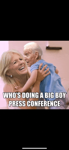 a picture of a woman holding a small child with the caption who 's doing a big boy press conference