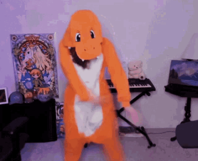 a person in a pokemon costume stands in front of a keyboard
