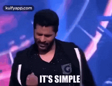 a man is dancing on a stage with the words `` it 's simple '' written on the screen .