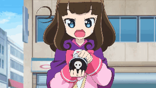 a little girl with a skull on her purse