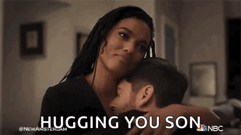 a woman hugging a man with the words hugging you son