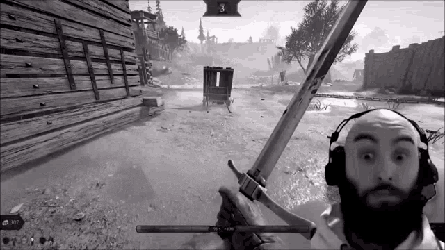 a man wearing headphones is holding a sword in a video game