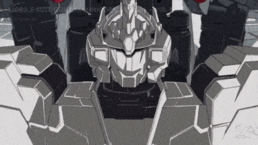 a close up of a robot with the words mobile suit on the bottom left