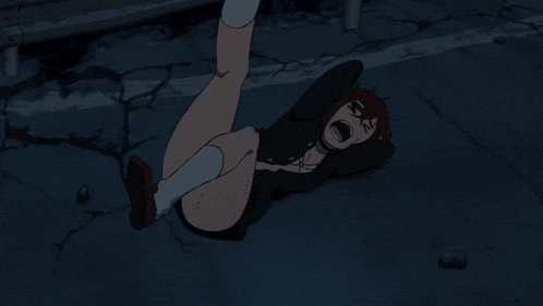 a person is laying on the ground with their feet up