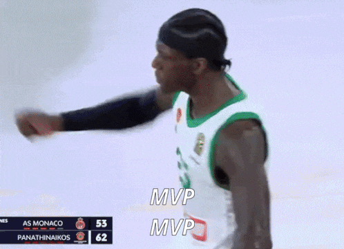a man in a green and white jersey with the number 25 on it