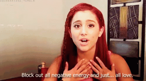a woman with red hair is saying block out all negative energy and just all love