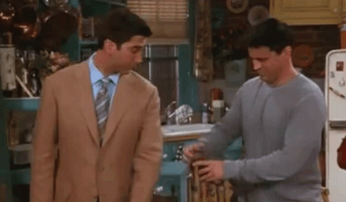Joey Tribbiani Ross Geller GIF - Joey Tribbiani Ross Geller Condom GIFs