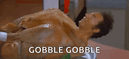 a man is laying on top of a turkey with the words gobble gobble written below him .