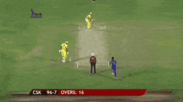 a group of cricket players are hugging each other and one of them has the number 81 on his back