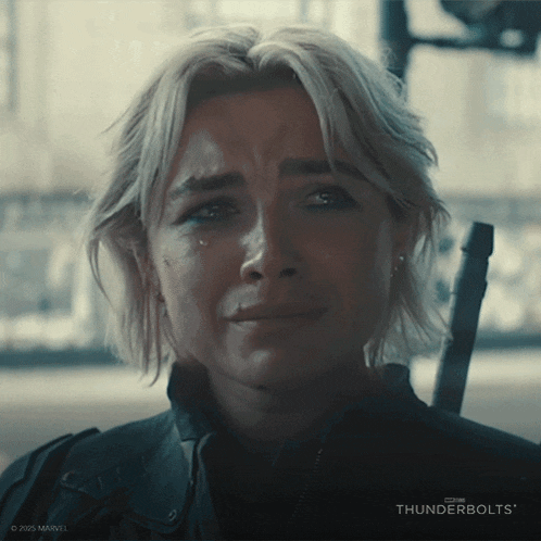 a close up of a woman 's face with the words thunderbolts on the bottom