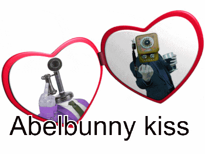 two heart shaped mirrors with the words abelbunny kiss