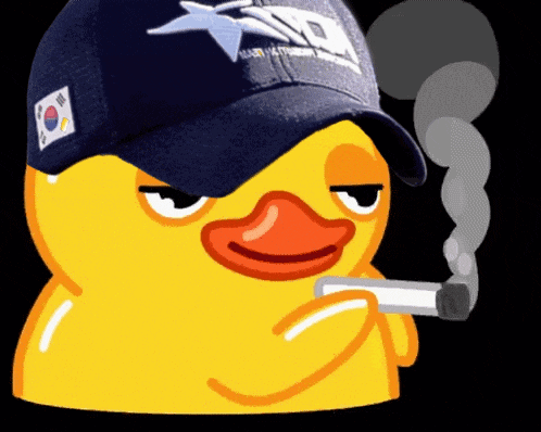 a yellow rubber duck wearing a baseball cap smoking a cigarette
