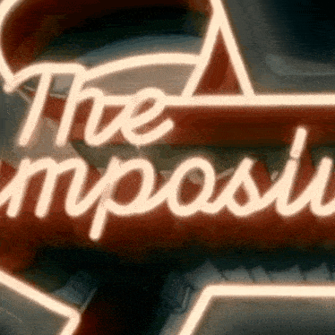 a neon sign that says the impossible is lit up