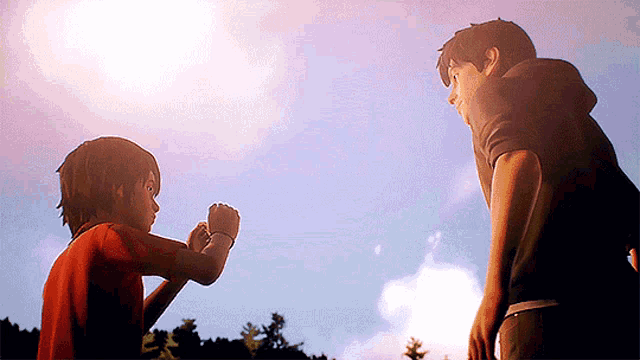 a man and a boy standing next to each other
