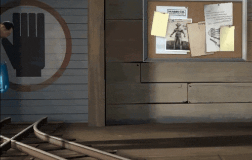 a bulletin board with a wanted poster for mann co.
