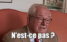 an older man in a suit and tie is sitting on a couch and saying `` n'est-ce pas ? ''