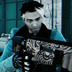 a man in a video game is holding a gun in his hand .