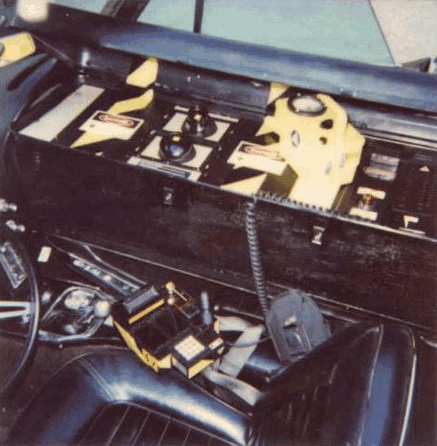 a close up of the dashboard of a car with a steering wheel and a steering wheel .