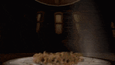 a computer generated image of an explosion with smoke coming out of the bottom