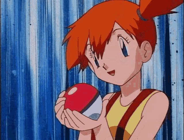a girl with red hair is holding a red and white ball in her hands