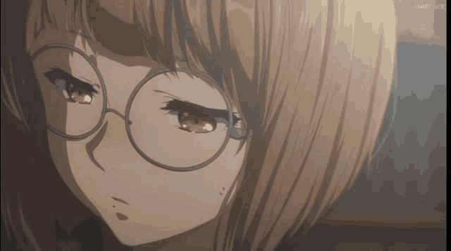 a close up of a girl 's face with glasses and a screen that says ' anime live ' on it