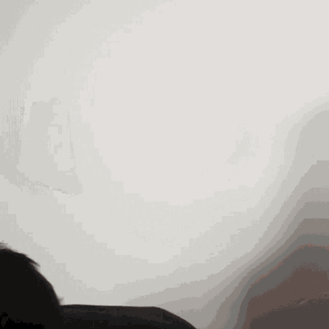 a close up of a man 's face with a white background