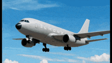 a belmondx airplane is flying in the blue sky